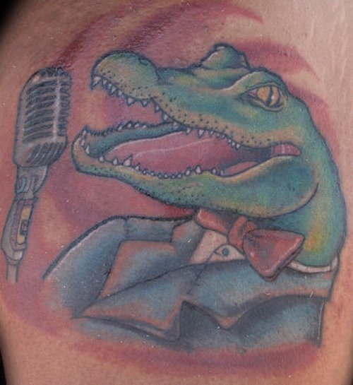 Singing Alligator Tattoo On Left Shoulder