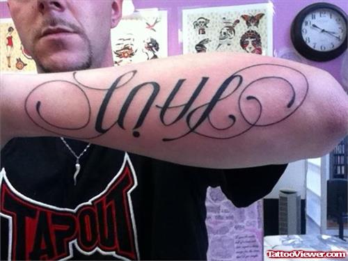 Love Pain Ambigram Tattoo On Left Arm