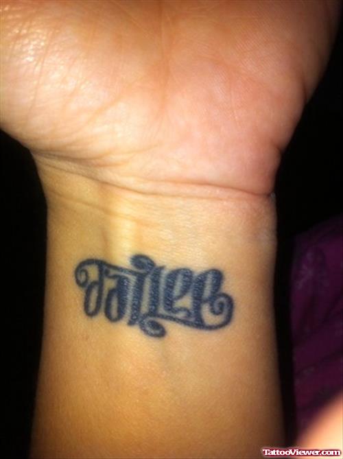 Fallen Ambigram Tattoo On Wrist
