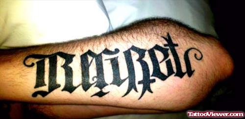 Regret Ambigram Tattoo On Arm
