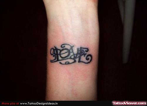 Love Ambigram Tattoo On Arm