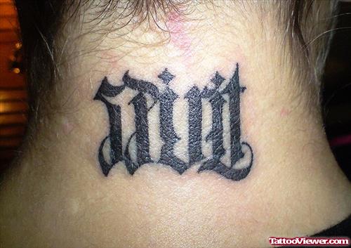 Saint Ambigram Tattoo On Nape