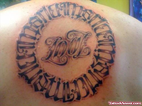 Grey Ink Ambigram Circle Tattoo On Back