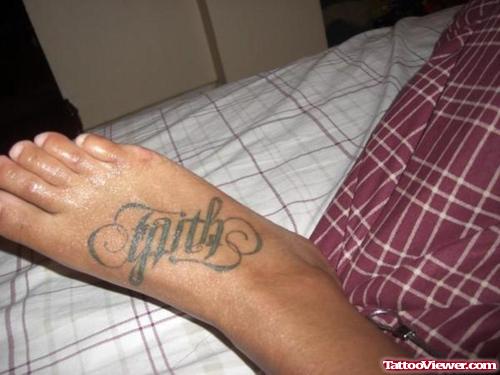 Faith Ambigram Tattoo On Right Foot