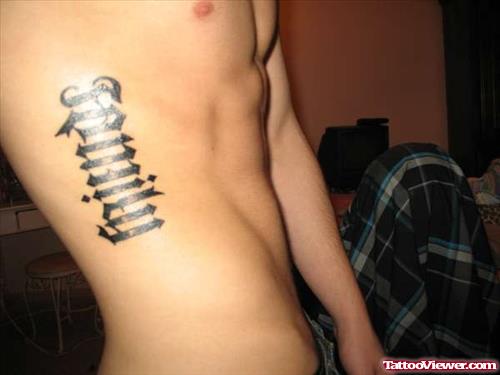 Family Ambigram Tattoo On Man side Rib