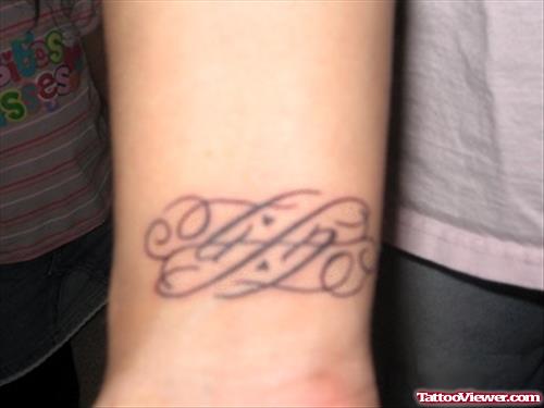 Life Ambigram Tattoo On Wrist