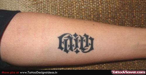 Grey Ink Faith Ambigram Tattoo On Arm