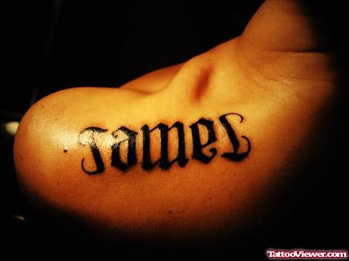 Ambigram Tattoo On Top Shoulder
