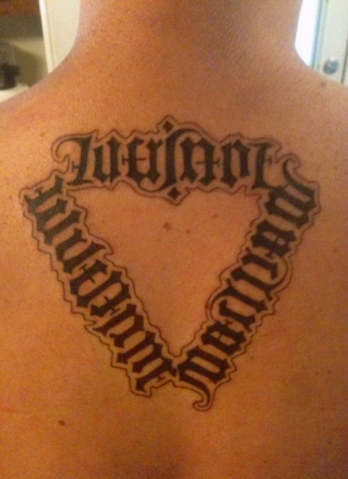 Ambigram Tattoos On Man Upperback