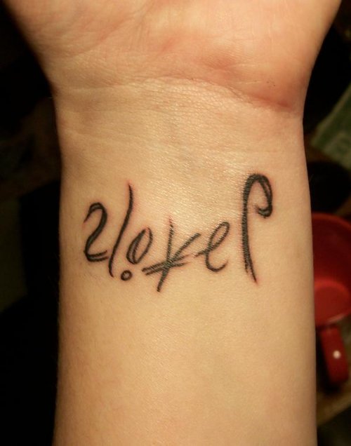 Love Ambigram Tattoo On Wrist