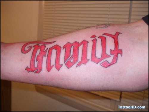 Red Ink Family Ambigram Tattoo On Arm
