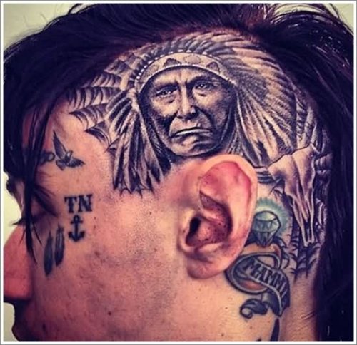 Grey Ink Native American Tattoo On Head