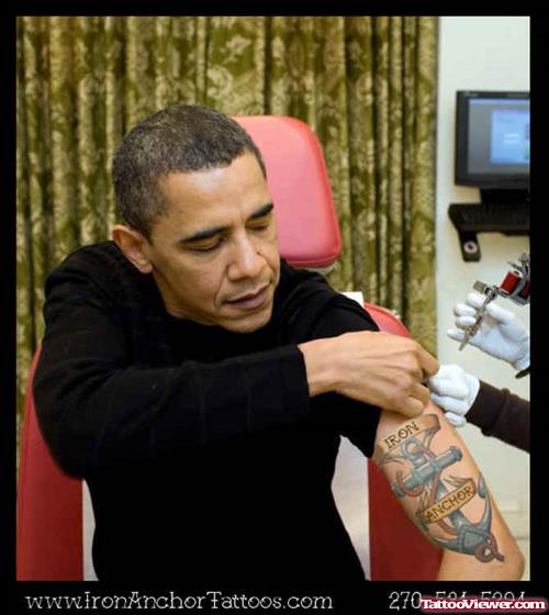 Obama showing His Anchor Tattoo