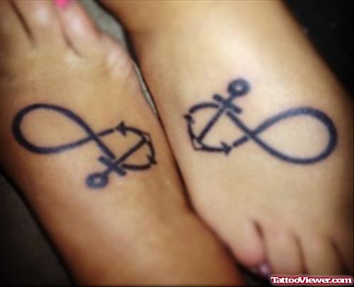 Infinity Symbols And Anchor Tattoos On Feet
