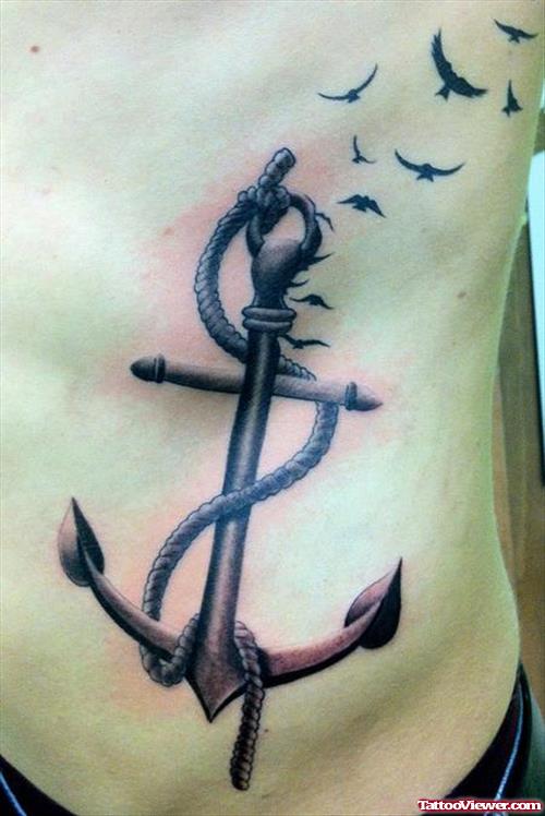 Anchor And Flying Birds Tattoo On Side