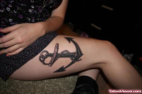 Dark Anchor Tattoo On Right Thigh