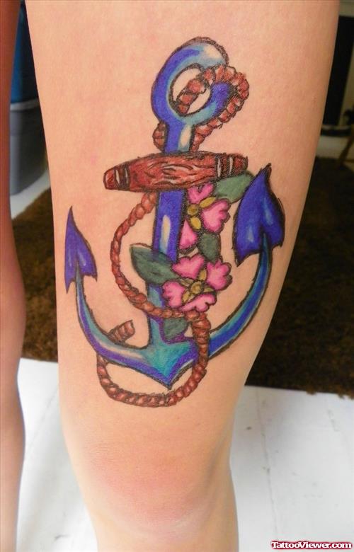 Purple Ink Anchor Tattoo On Left Thigh