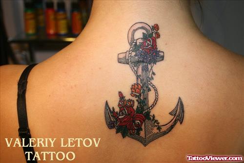 Red Flowers And Anchor Tattoo On Upperback