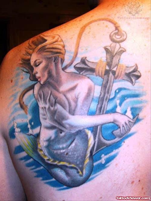 Mermaid In Water And Anchor Tattoo On Back
