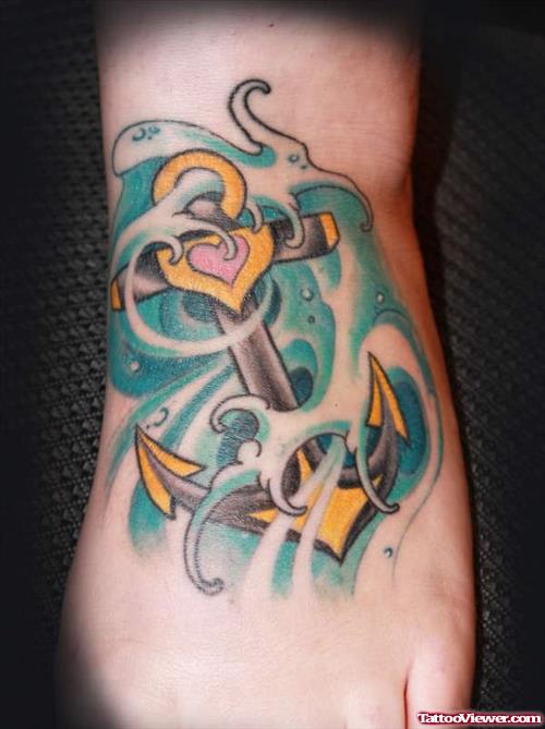 Colored Anchor Tattoo On Left Foot