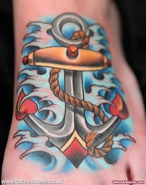 Awesome Colored Anchor Tattoo On Left Foot