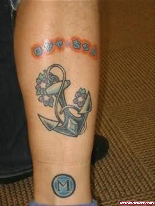 Black Anchor Tattoo On Leg