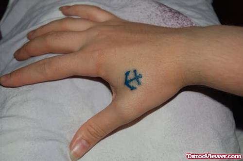 Tiny Anchor Tattoo On Hand