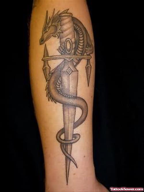 Dragon With Sword Tattoo