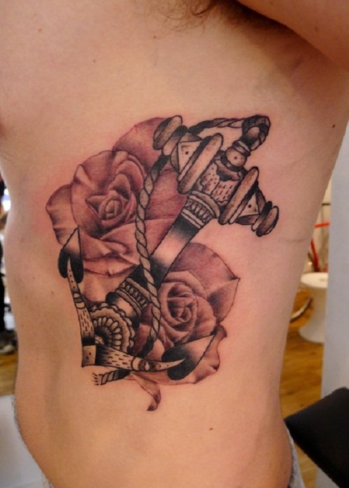 Flowers And Anchor Tattoo On Rib