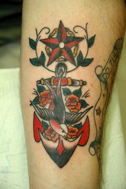 Nautical Star Flying Bird And Anchor Tattoo