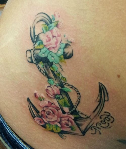 Pink Flowers And Anchor Tattoo On Lower Back