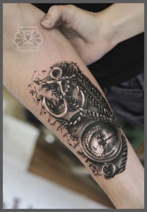 Rope Anchor And Compass Tattoo On Forearm