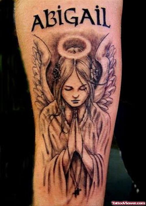 Praying Angel Grey Ink Tattoo On Sleeve