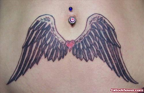 Navel Piercing And Tiny Heart Angel Wings Tattoo On Belly