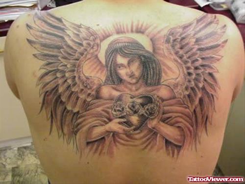 Angel With Heart Tattoo On Upperback