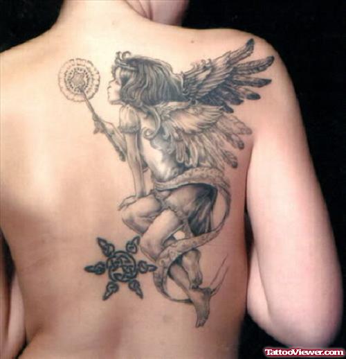 Angel With Dandelion Puff Tattoo On Back