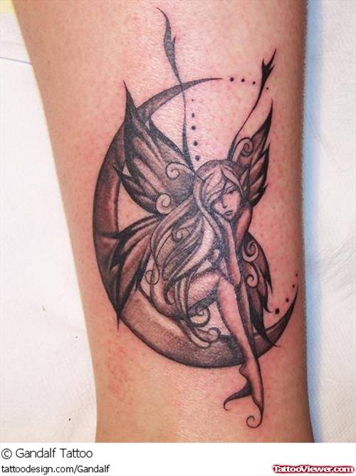 Fairy Angel Sitting On Moon Tattoo