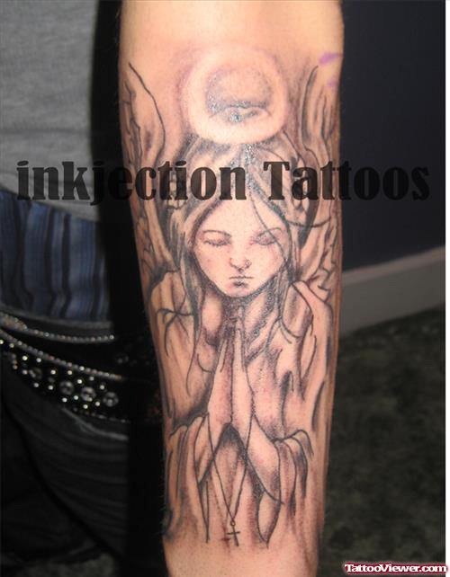 Grey Ink Praying Angel Tattoo On Left Arm