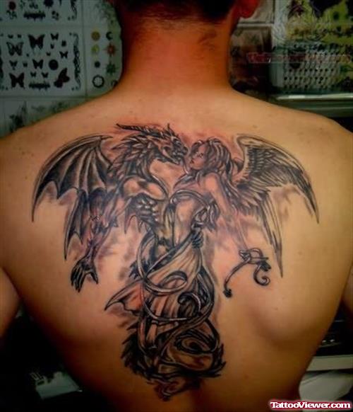 Grey Ink Dragon And Angel Tattoo On Man Back