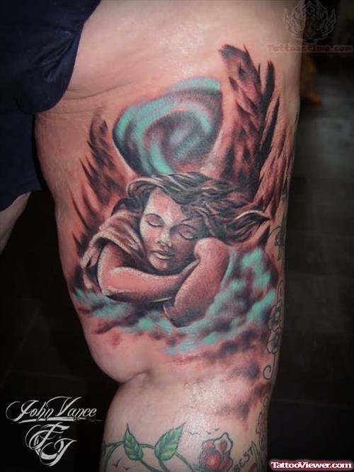 Sleeping Angel Tattoo On Back Leg