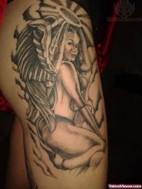 Grey Ink Angel Tattoo On Thigh