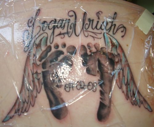 Memorial Footprints With Angel Wings Grey Ink Tattoo On Back