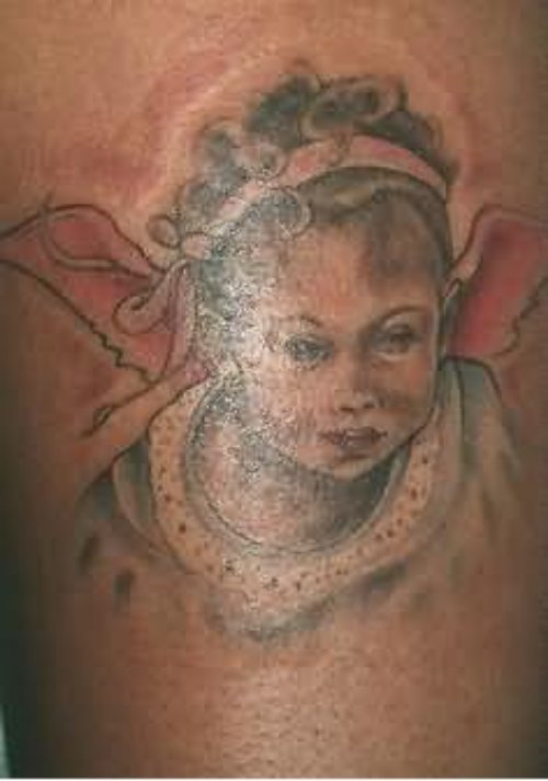 BabyAngel Tattoo Design On Bicep