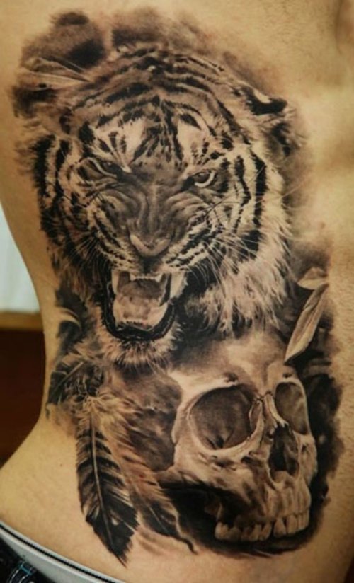 Grey Ink Skull And Tiger Animal Tattoo On Side Rib