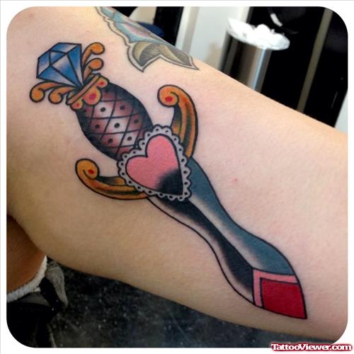 Colored Dagger Animated Tattoo On Bicep