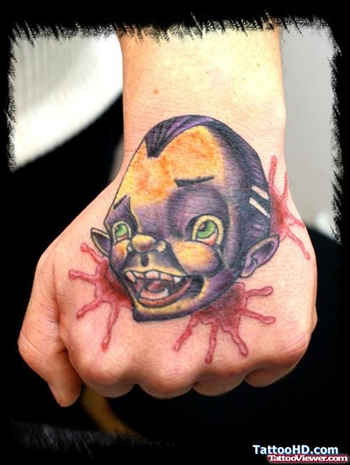 Animated Scary Cartoon Head Tattoo On Hand