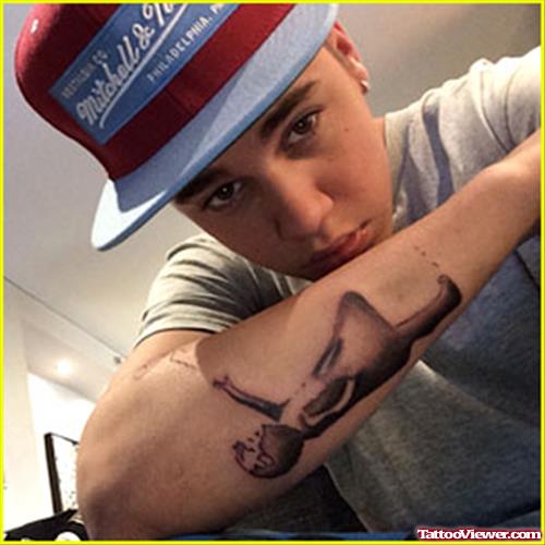 Justin Beiber Animated Tattoo On Right Forearm