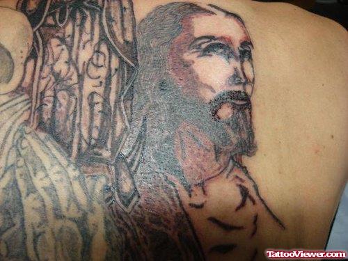 Grey Ink Animated Tattoo On Back Shoulder