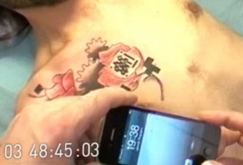Barcode Animated Tattoo On Man Chest