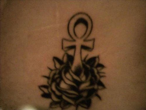Black Flower And Ankh Tattoo